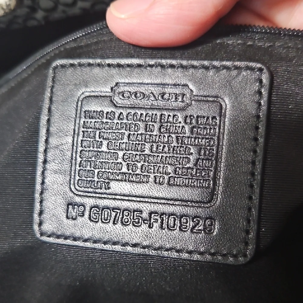 Coach satchel signature